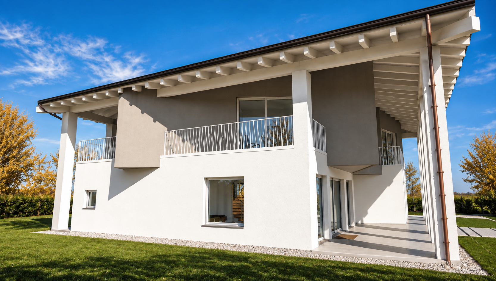 Gazebo coperto con salotto esterno affacciato sulla piscina di Villa E|I