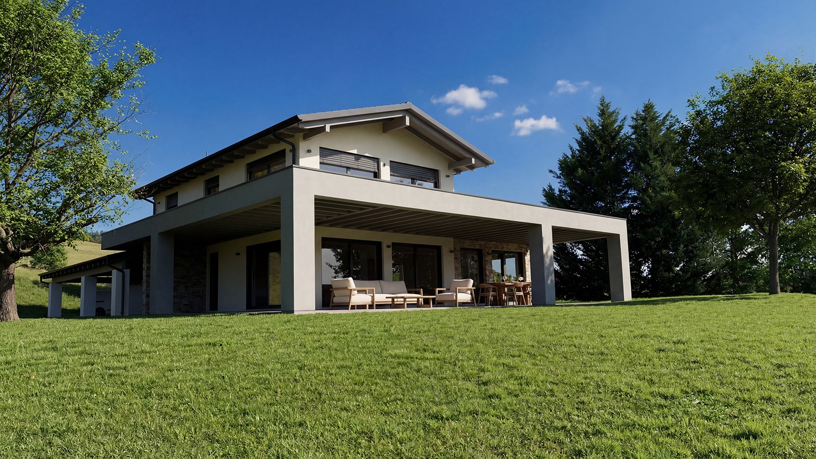 Il grande portico di Villa E|L aperto verso il giardino e il paesaggio